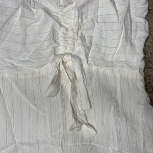 Woven white with lured gold stripes ruched front dress beautiful details.